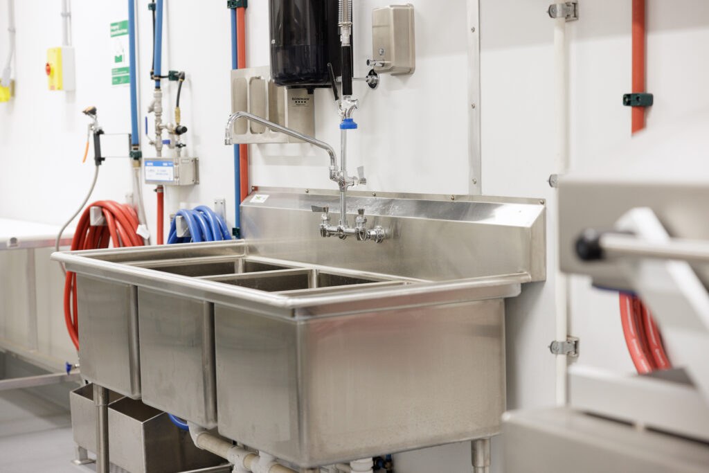 Clean stainless prep area inside a USDA facility